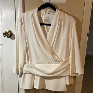 The Fold Cream Wrap Peplum Blouse